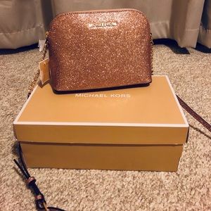 Micheal Kors pink sparkle cross body bag